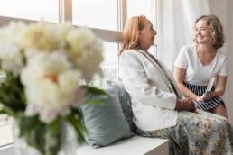 two women discussing the expectation in living in sydney